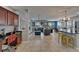 Open-concept living area featuring tile flooring, abundant natural light, and stylish contemporary decor at 5914 Goldenbark Pl, Lithia, FL 33547