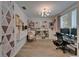 Spacious home office with stylish decor, modern lighting, and ample storage space at 5914 Goldenbark Pl, Lithia, FL 33547