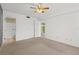 View of bedroom and bathroom and neutral carpet at 5920 80Th N St # 103, St Petersburg, FL 33709