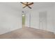 Neutral bedroom with connecting rooms and closet spaces at 5920 80Th N St # 103, St Petersburg, FL 33709