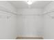 A well-lit closet featuring installed shelving for optimal storage at 5920 80Th N St # 103, St Petersburg, FL 33709