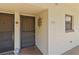 Exterior entrance featuring unit number and two doors at 5920 80Th N St # 103, St Petersburg, FL 33709
