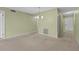 Living room featuring tile entryway, neutral paint, and ceiling fan at 5920 80Th N St # 103, St Petersburg, FL 33709