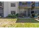 View of a peaceful ground floor screened patio with garden area at 5920 80Th N St # 103, St Petersburg, FL 33709