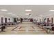 Large community hall with a stage, tables, and chairs for events and gatherings at 5967 Terrace Park N Dr # 101, St Petersburg, FL 33709