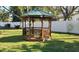 Community gazebo on manicured lawn at 5967 Terrace Park N Dr # 101, St Petersburg, FL 33709