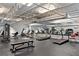 Well-equipped gym featuring treadmills, elliptical machines, weights, and ample workout space at 5967 Terrace Park N Dr # 101, St Petersburg, FL 33709