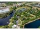 Overhead view of the area surrounding the property, showing the waterways, woods, and roadways at 6501 Barcellona Rd, Land O Lakes, FL 34637