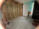 Bedroom displays exposed studs and doorway at 6710 Hibiscus S Ave, South Pasadena, FL 33707