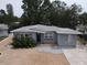 Charming single-story home with a well-maintained front yard and neutral gray paint at 6710 Hibiscus S Ave, South Pasadena, FL 33707