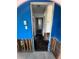 Hallway displaying exposed framework and peeling walls at 6710 Hibiscus S Ave, South Pasadena, FL 33707