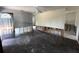 View of a Living Room in need of full renovation; a blank canvas for creating your dream living space at 6710 Hibiscus S Ave, South Pasadena, FL 33707