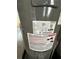 Close-up showing the water heater's specifications and safety warnings for informed use at 6710 Hibiscus S Ave, South Pasadena, FL 33707