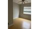 Standard bedroom includes laminate flooring, ceiling fan, and ample natural light at 7210 N Manhattan Ave # 1311, Tampa, FL 33614