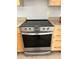 Stainless steel Whirlpool stove with glass cooktop and oven at 7210 N Manhattan Ave # 1311, Tampa, FL 33614