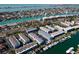 Aerial view of waterfront community with boat docks and serene water views at 745 Pinellas Bayway S # 206, St Petersburg, FL 33715
