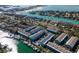 Aerial view of waterfront community with boat docks and serene water views at 745 Pinellas Bayway S # 206, St Petersburg, FL 33715