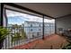Relaxing outdoor balcony featuring a view of the townhome community and ample space to sit at 745 Pinellas Bayway S # 206, St Petersburg, FL 33715