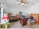 Bedroom featuring a ceiling fan, natural light, and neutral carpet at 745 Pinellas Bayway S # 206, St Petersburg, FL 33715