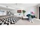 Spacious living room featuring a modern design and bar area with kitchen view at 745 Pinellas Bayway S # 206, St Petersburg, FL 33715