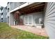 Outdoor patio with spiral staircase and attached AC unit at 745 Pinellas Bayway S # 206, St Petersburg, FL 33715