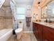 Bathroom featuring stylish fixtures, decor, and vanity at 7851 120Th St, Seminole, FL 33772