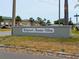 Community sign for Ridgewood Mountain Village, near local amenities and shopping, offering a convenient lifestyle at 7851 120Th St, Seminole, FL 33772