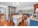 Open dining area with seating for six and view to the living area at 7851 120Th St, Seminole, FL 33772