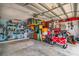 Cluttered two-car garage providing storage and parking at 7851 120Th St, Seminole, FL 33772