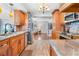 Bright kitchen with stainless steel appliances and a view into the living area at 7851 120Th St, Seminole, FL 33772