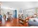 Bright living and dining area featuring hardwood floors, and colorful decor at 7851 120Th St, Seminole, FL 33772