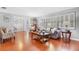 Bright and airy living room with hardwood floors, stylish furniture, and ample natural light at 7851 120Th St, Seminole, FL 33772