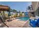 Inviting in-ground pool with a brick patio and lounging area, perfect for relaxation at 7851 120Th St, Seminole, FL 33772