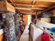 Hallway of a storage room, filled with holiday decor and personal items at 7851 120Th St, Seminole, FL 33772