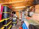 Packed storage room with containers and holiday decor at 7851 120Th St, Seminole, FL 33772