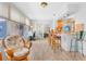 Bright sunroom with tile floors and access to the kitchen at 7851 120Th St, Seminole, FL 33772