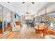 Bright sunroom with tile floors and comfortable seating at 7851 120Th St, Seminole, FL 33772