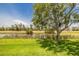 Enjoy picturesque views of the serene pond and lush backyard at 817 Eagle Ln, Apollo Beach, FL 33572