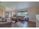 Inviting living room showcases wood-look floors, stylish furniture, and a relaxing ambiance at 817 Eagle Ln, Apollo Beach, FL 33572