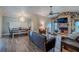 Inviting living room boasts a stone fireplace, wood floors, and a cozy seating area at 817 Eagle Ln, Apollo Beach, FL 33572