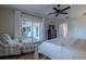 Spacious main bedroom with access to the patio creates a relaxing private oasis at 817 Eagle Ln, Apollo Beach, FL 33572