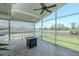 Enjoy outdoor living in the screened lanai with tranquil water views at 817 Eagle Ln, Apollo Beach, FL 33572