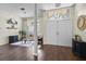 Inviting foyer with hardwood floors, double doors, and a bright, airy atmosphere at 8401 Ashford Pl, Trinity, FL 34655