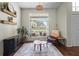 Cozy sitting area with natural light from a front-facing window at 8401 Ashford Pl, Trinity, FL 34655