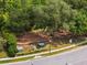 A neighborhood playground is nestled among mature trees, with swings, slides, and picnic benches for residents to enjoy at 8401 Ashford Pl, Trinity, FL 34655