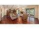 Inviting living room with wood floors, fireplace, and built-in shelving provides a cozy, stylish gathering space at 8517 Woodwick Ct, Tampa, FL 33615