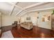 Comfortable living room with hardwood floors, vaulted ceilings, and easy access to the kitchen at 8517 Woodwick Ct, Tampa, FL 33615