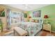 Bright bedroom featuring neutral walls, modern lights, and plenty of natural light at 9018 39Th N Ln # 5, Pinellas Park, FL 33782