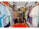 Spacious walk-in closet featuring plenty of shelves, rods, and storage space at 9018 39Th N Ln # 5, Pinellas Park, FL 33782