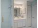 Bathroom featuring a glass door shower and sink at 934 Lucas Ln, Oldsmar, FL 34677
